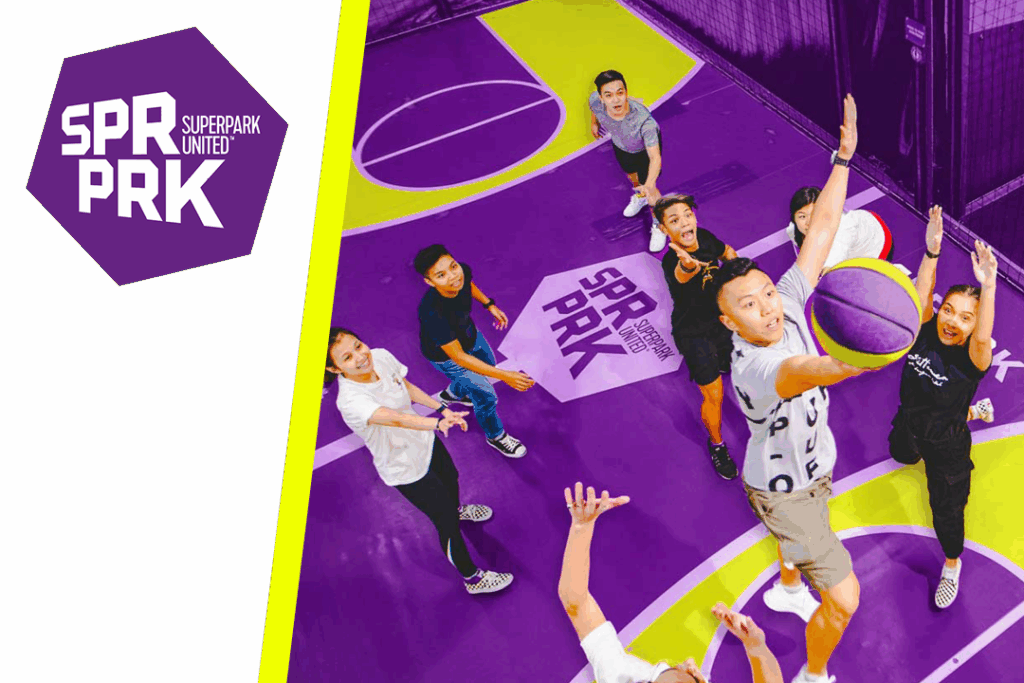 Young adults playing basketball, SuperPark logo in the corner